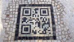  Rio de Janeiro is mixing technology with tradition to provide tourists information about the city by embedding bar codes into the black and white mosaic sidewalks that are a symbol of the city.